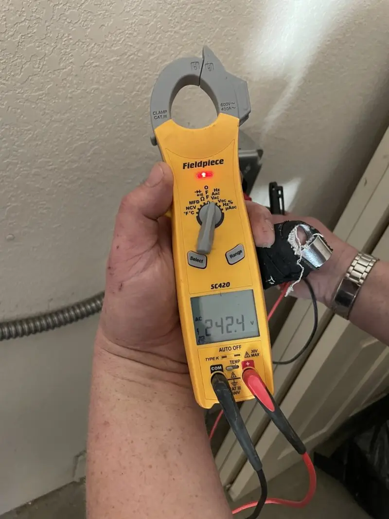 Voltage testing with clamp meter during Hot Tub / Pool Electrical Wiring in Canton